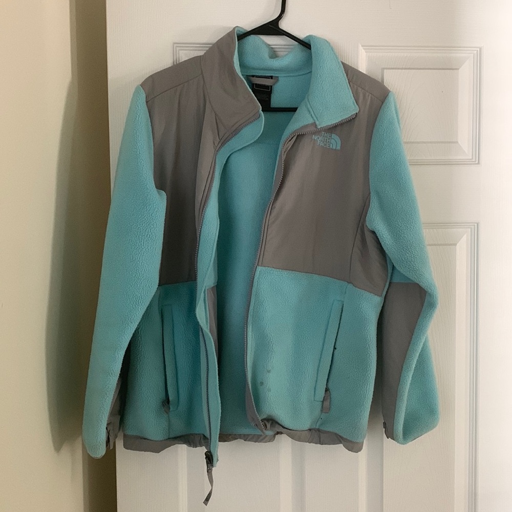 Light blue North Face jacket, Girls Size XL.